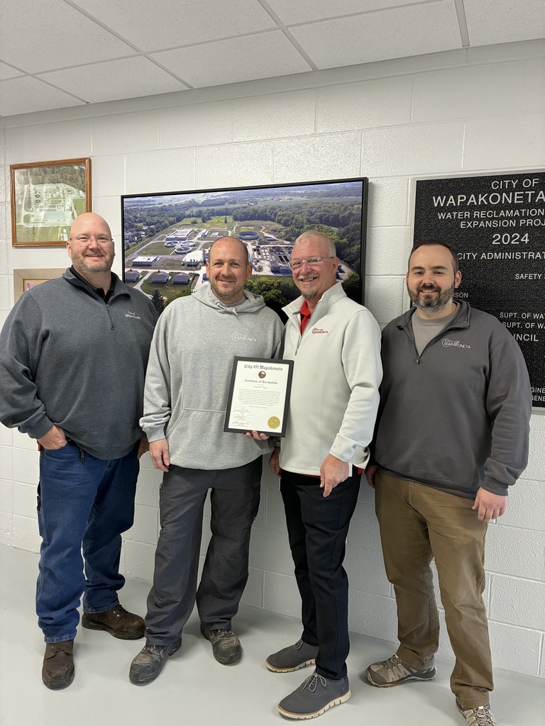 Water Reclamation Superintendent Justin Waid, Chad Topp, Mayor Lee, Safety Service Director Tyler Price