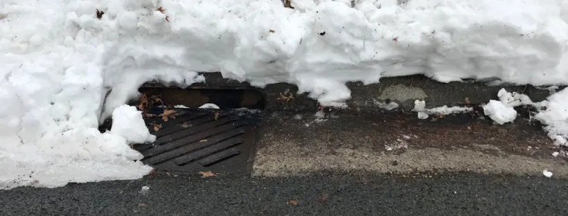 snow melting at drain