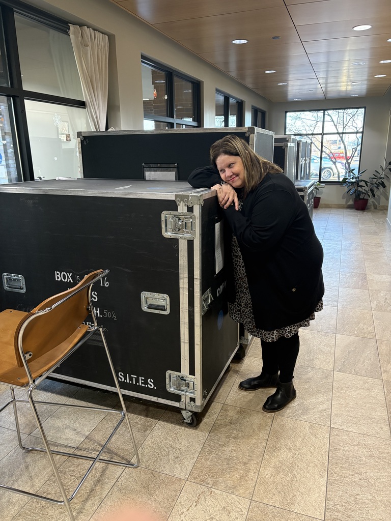 Library staff and volunteers worked hard Wednesday morning to setup the Smithsonian Traveling Exhibit
