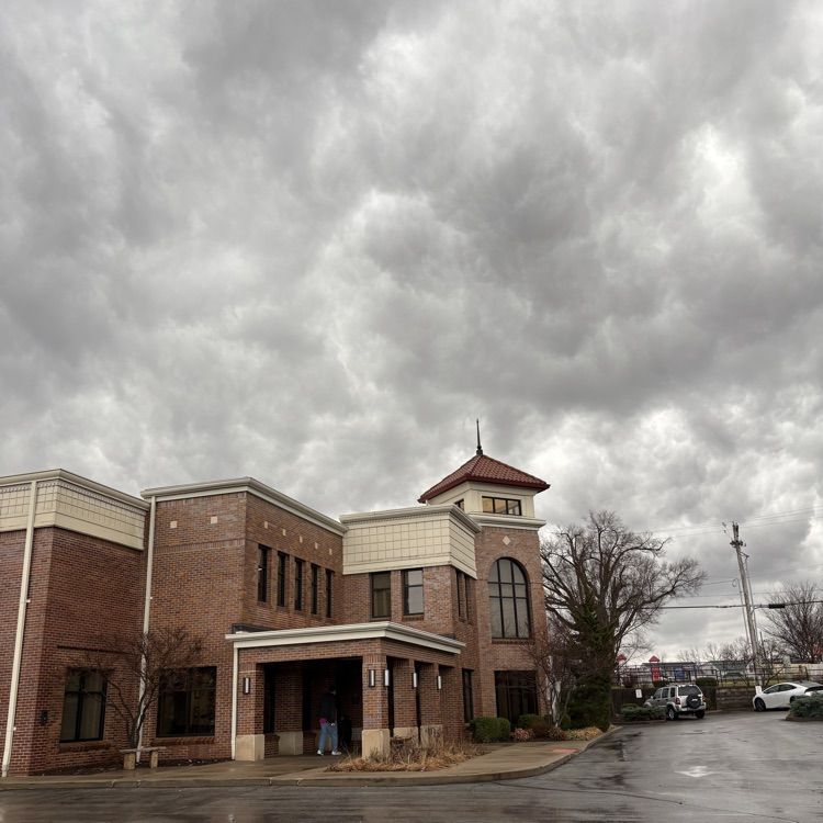 the library with dark clouds