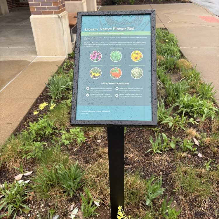 native library flower bed sign