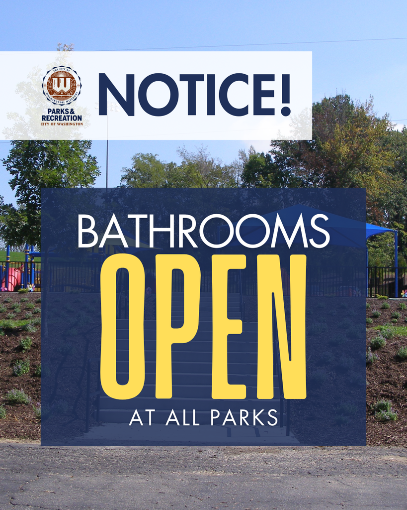 Image of a playground taken from a parking lot looking up a hill. Reads, Bathrooms open at all parks.