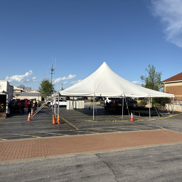 big tent in the library parking lot