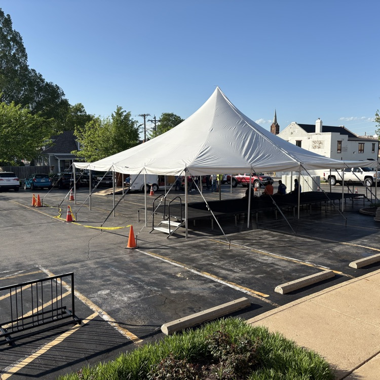 big tent in the library parking lot