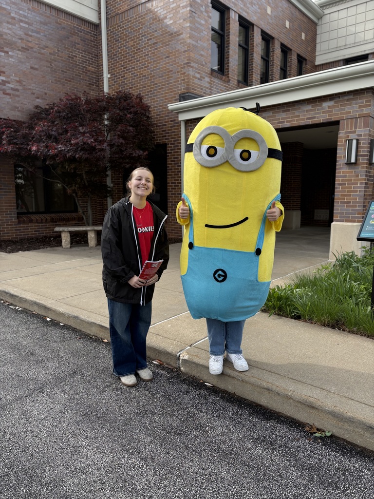 Minion and his handler outside the library