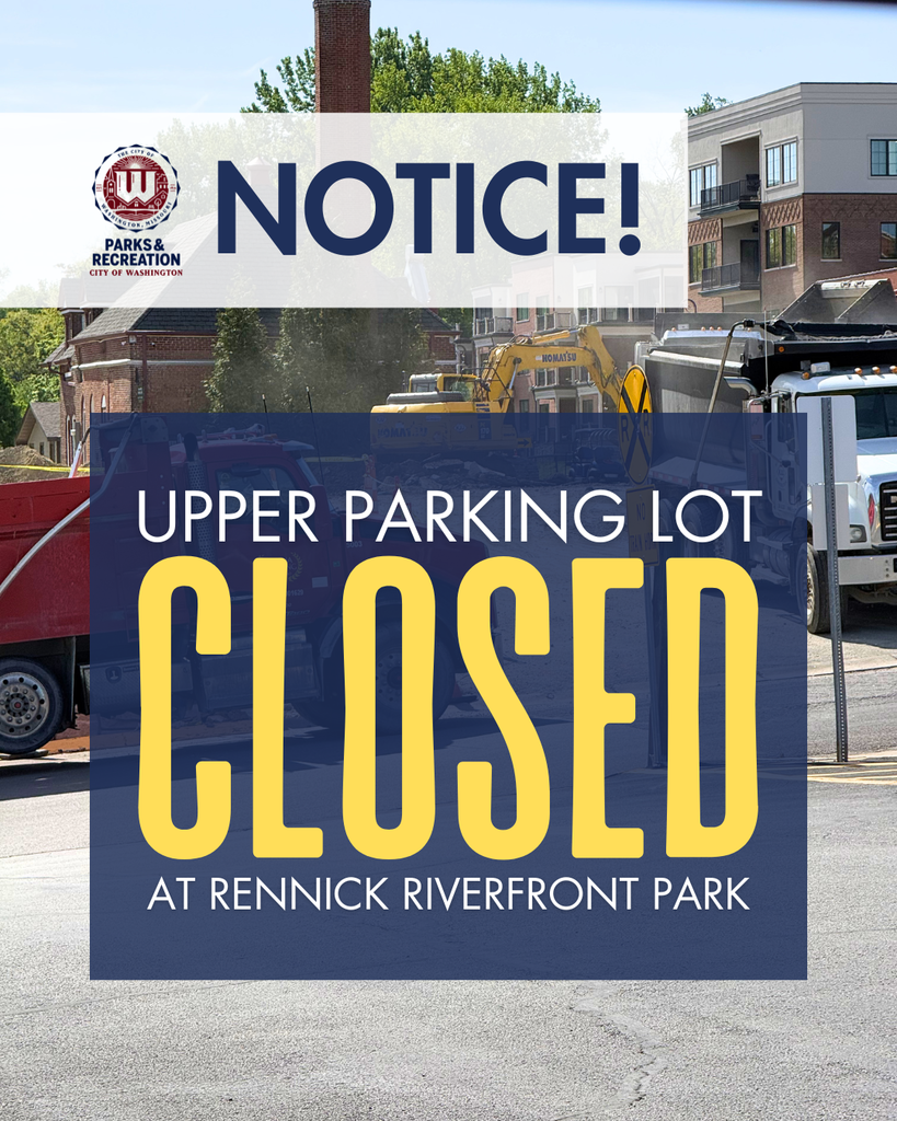 NOTICE! Upper Parking Lot CLosed at Rennick Riverfront Park. Image of dump trucks and an excavator at the front parking lot begining demolition. 