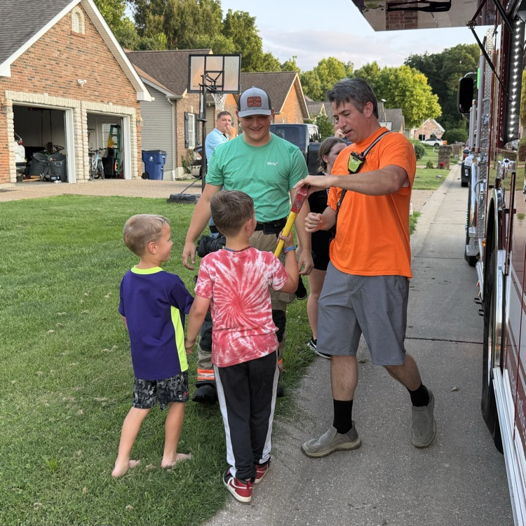 kids with fire personnel