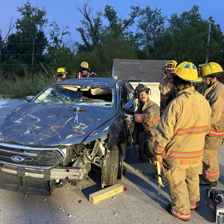 firefighters teaching vehicle extrication