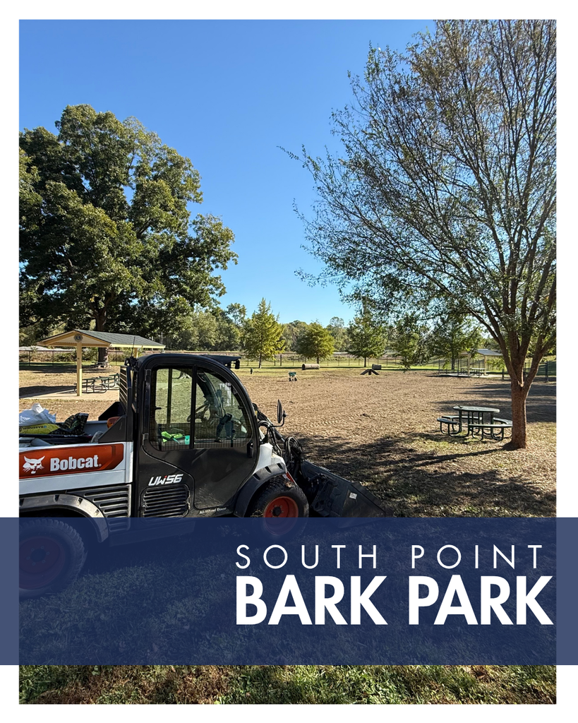 Reads South Point Bark Park - Image of a bobcat plowing the crabgrass in the dog park to prepare it for new seed.