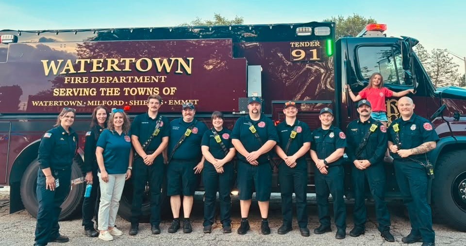 Watertown Firefighters standing in front of a fire truck