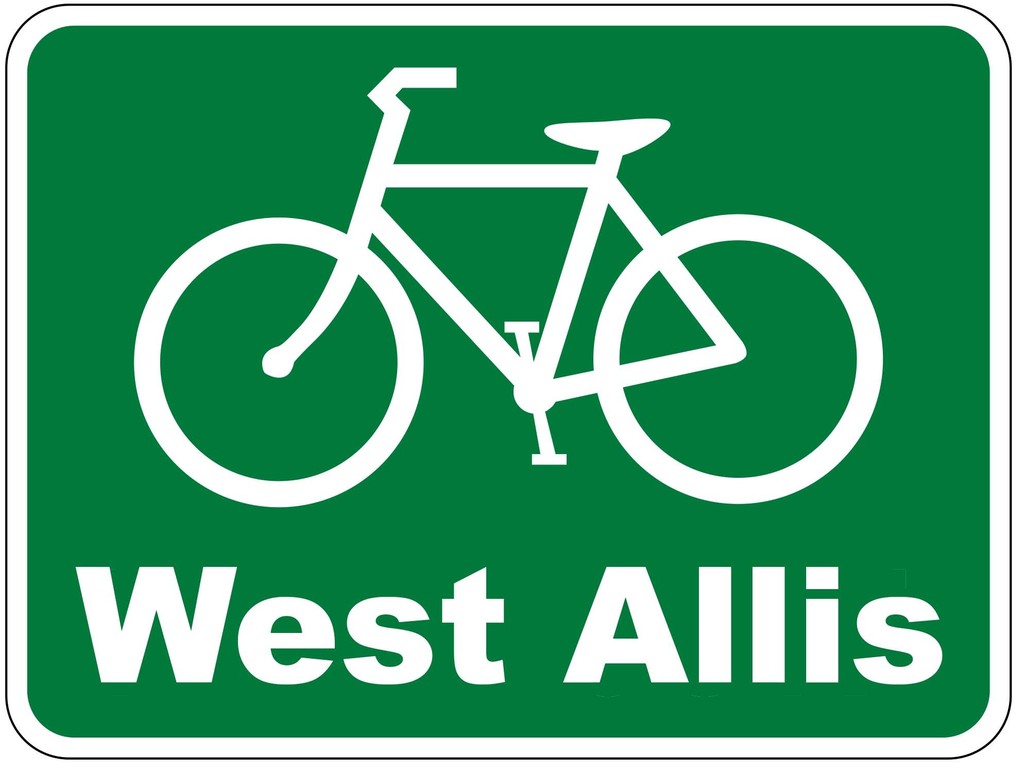A photo of a bike sign that shows a bike and the words West Allis