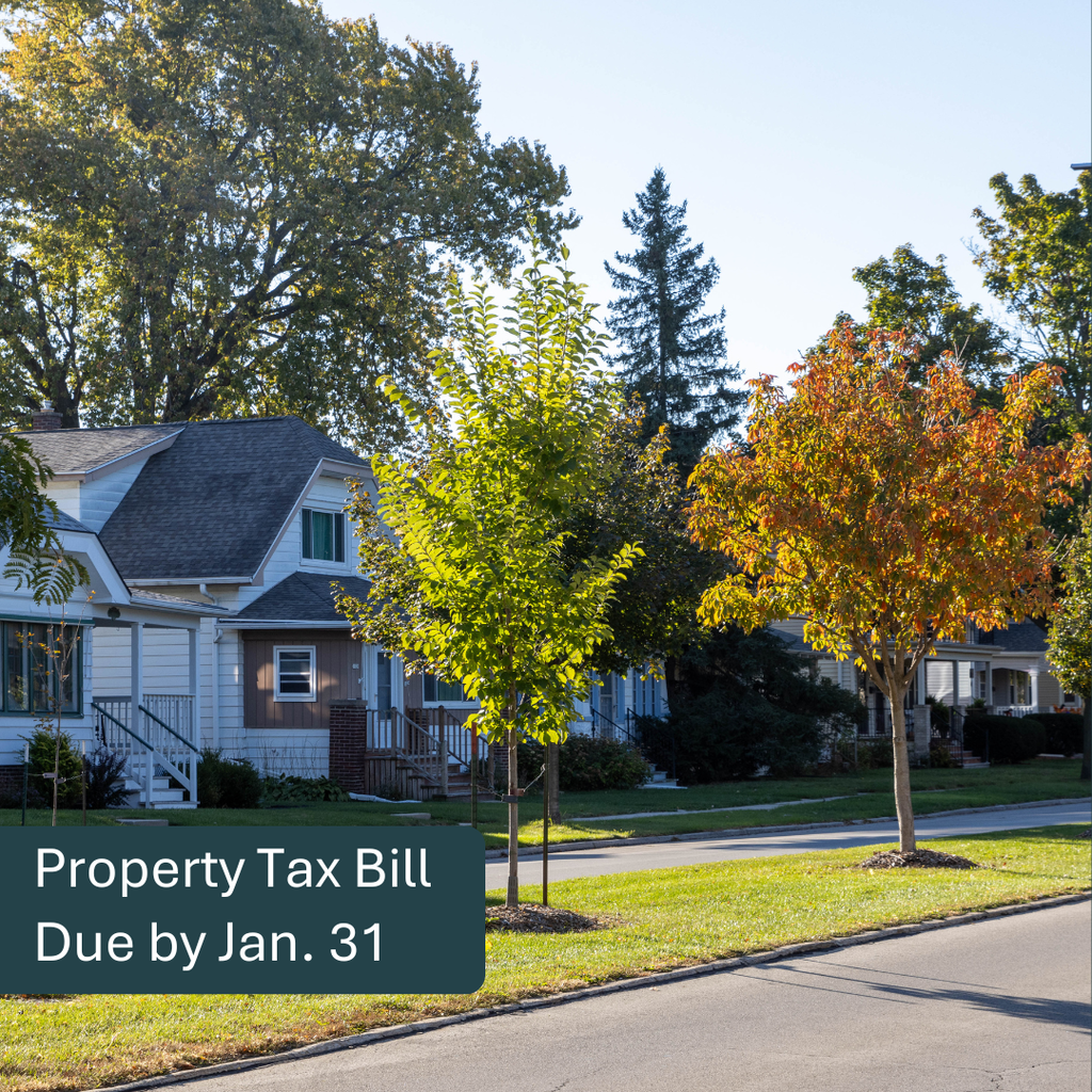 A photo of houses on a West Allis street. Text reads "Property Tax Bill Due by Jan. 31"