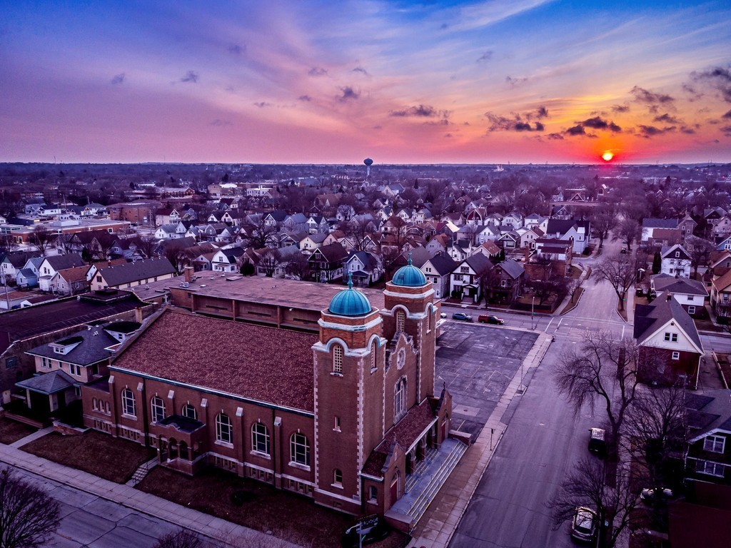 An aerial photo of West Allis at sunset