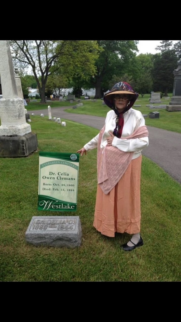 Female actress at gravestone in Evergreen Cemetery