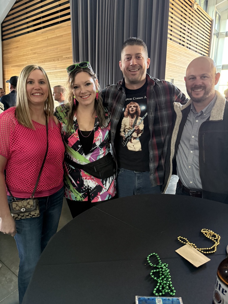 Softball coach poses