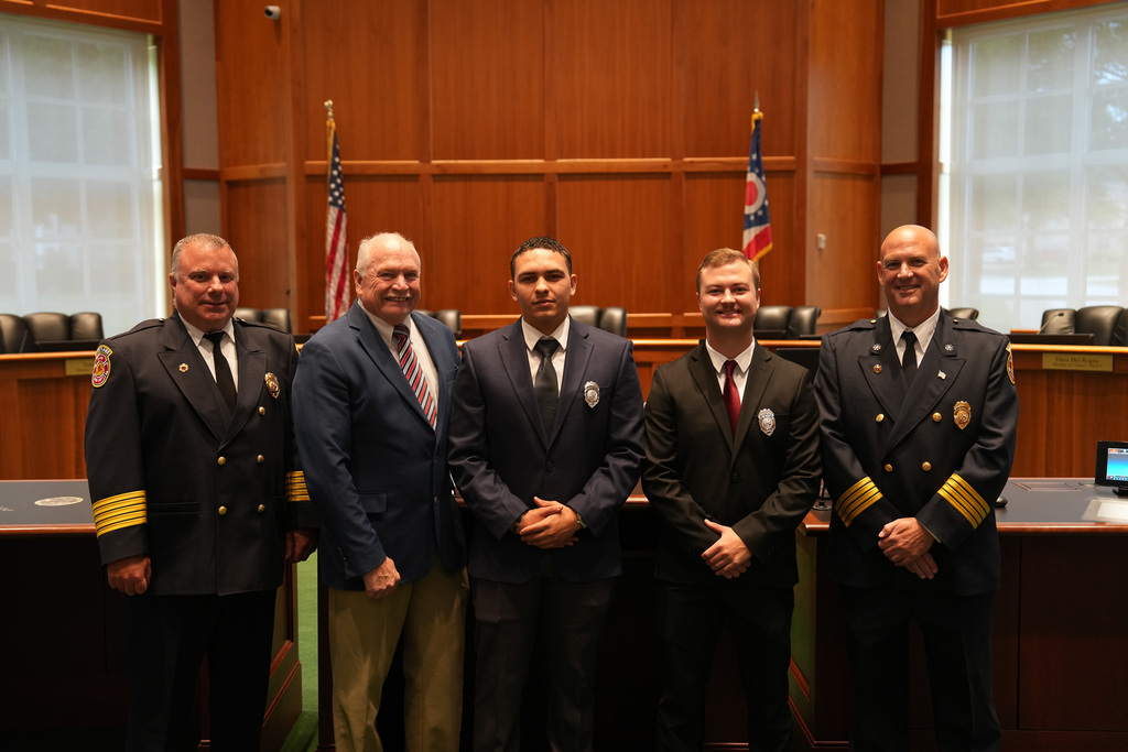 New firefighters Matt Freeman and Asher Crawford with Mayor Clough and Westlake Fire Department chiefs in Council Chambers after their swearing-in