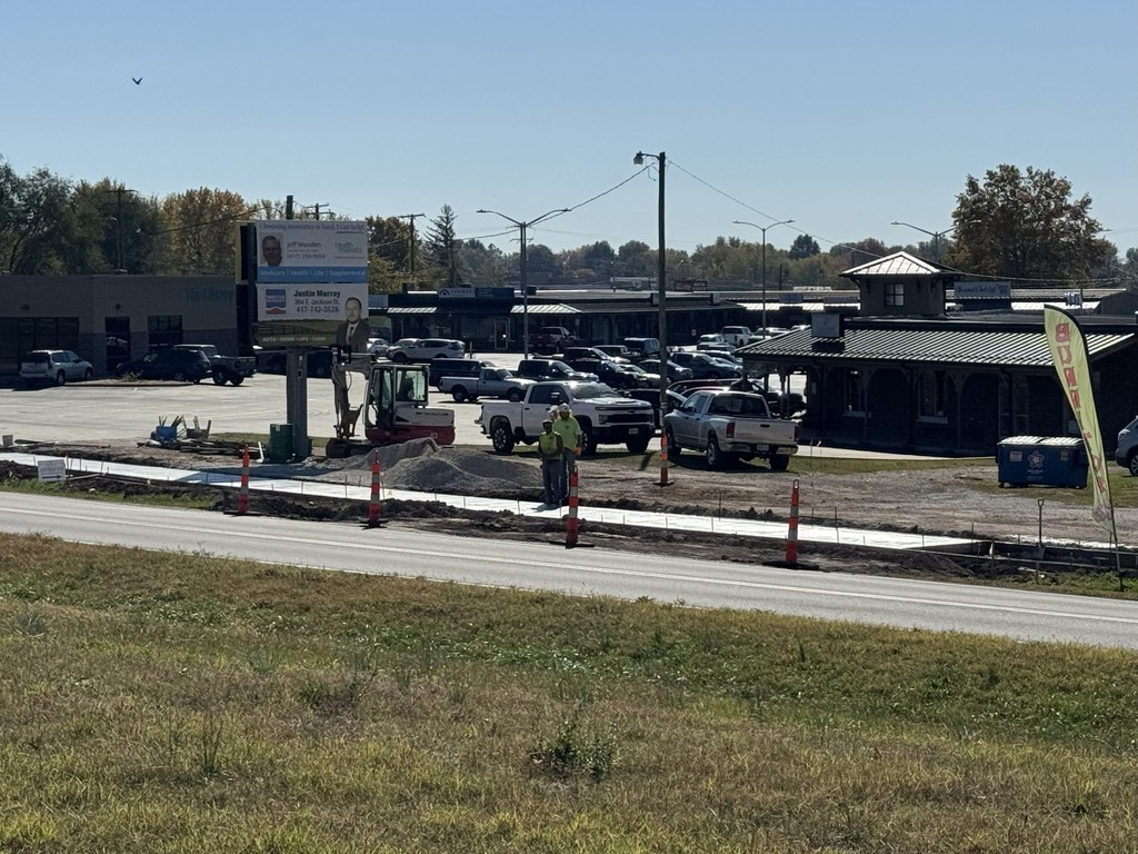 Picture of contractors working on the Jackson St. sidewalk
