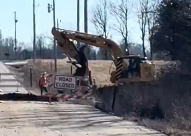 An Excavator Digging at FR103 and 106