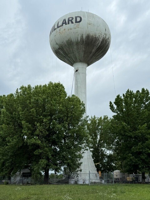 Meadows Water Tower showing lines hanging from the top