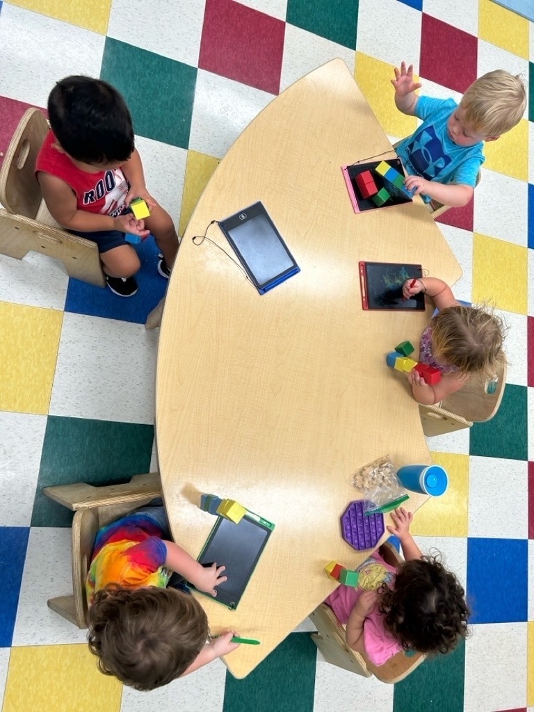5 students with table toys