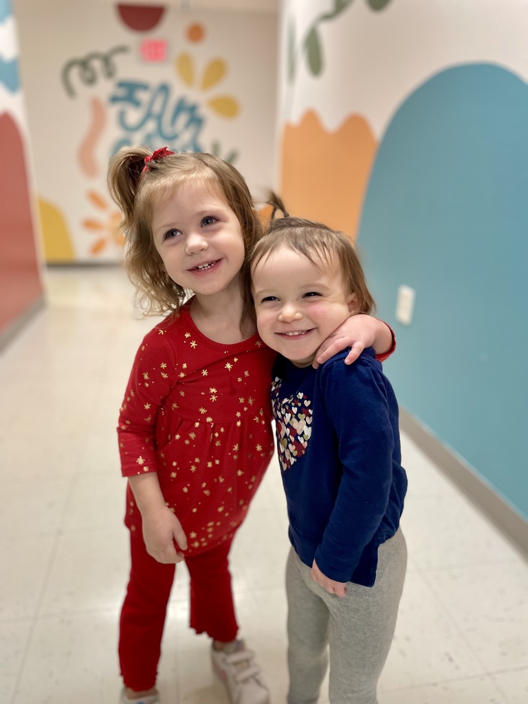 2 smiling toddler girls