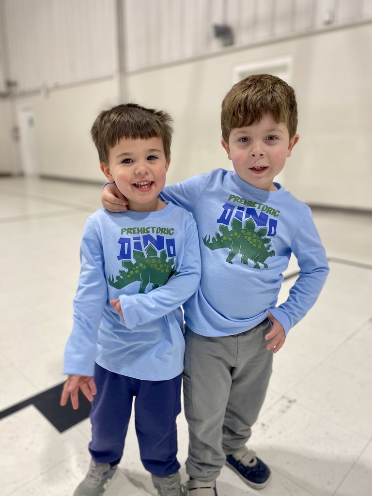 2 boys in matching shirts