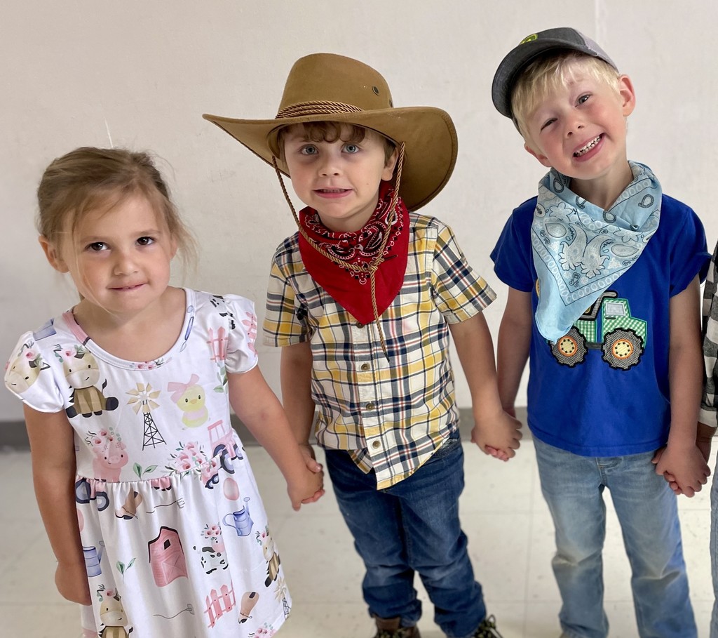 3 3 yr olds dress like farmers