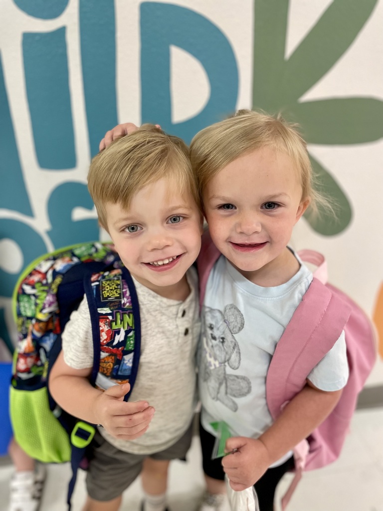 2 cute kids smiling