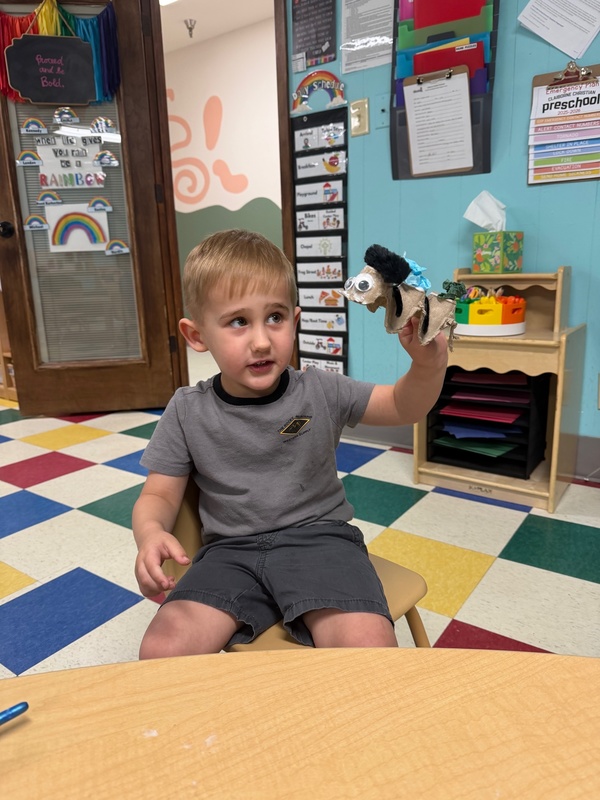 3 yr old boy showing off his bug