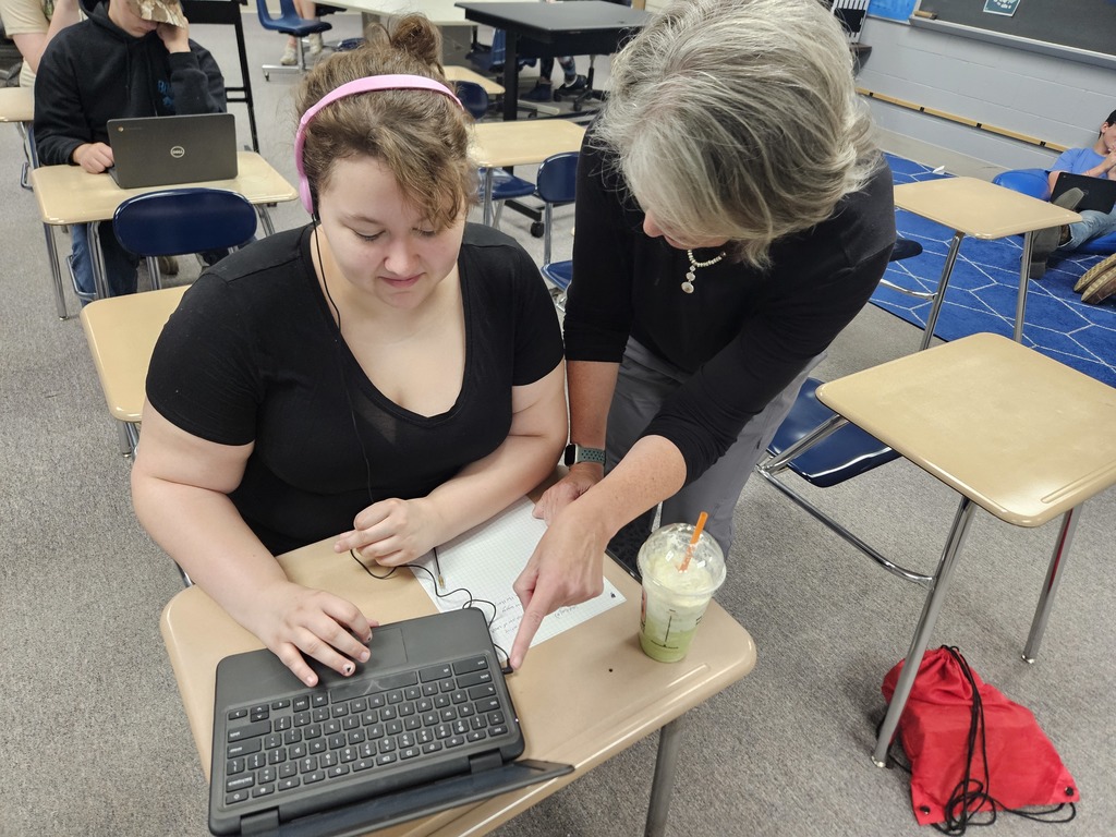Sarah has made up several classes here at the summer program. She is currently getting help with math from Mrs. Travis!