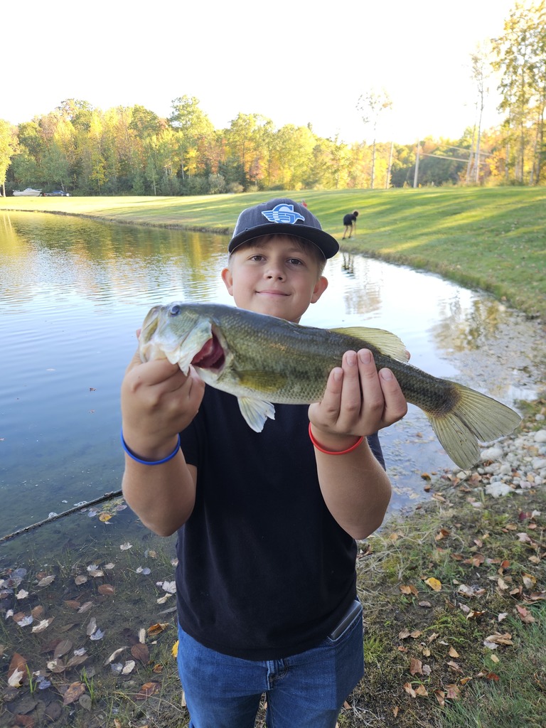 Gladwin SPARKS student showing fish.