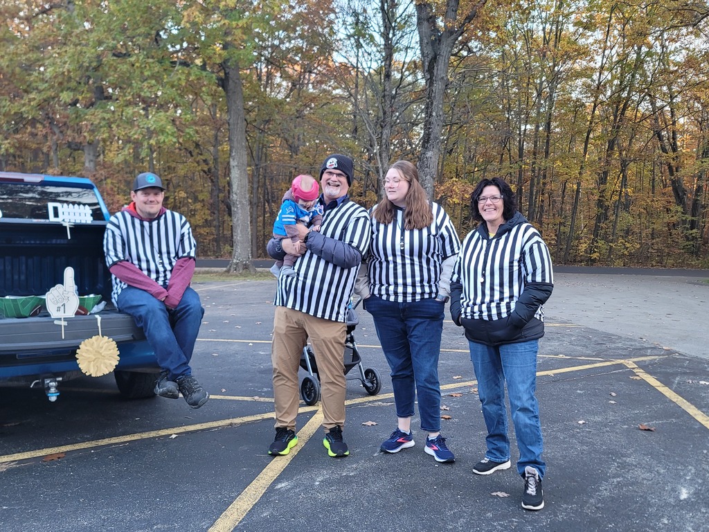 4 referees and the cutest football player ever!