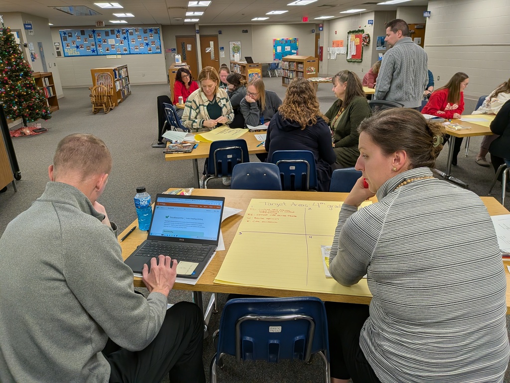 Coleman Elementary Teachers chart their data findings.
