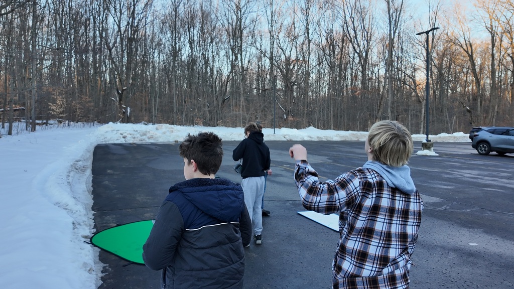Students spotting their drone.