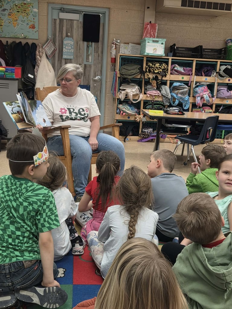 Speech-Language Pathologist, Barb Tyler reading to 1st grade classroom.