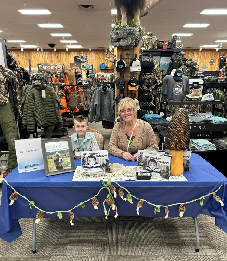 Molly signing her new book