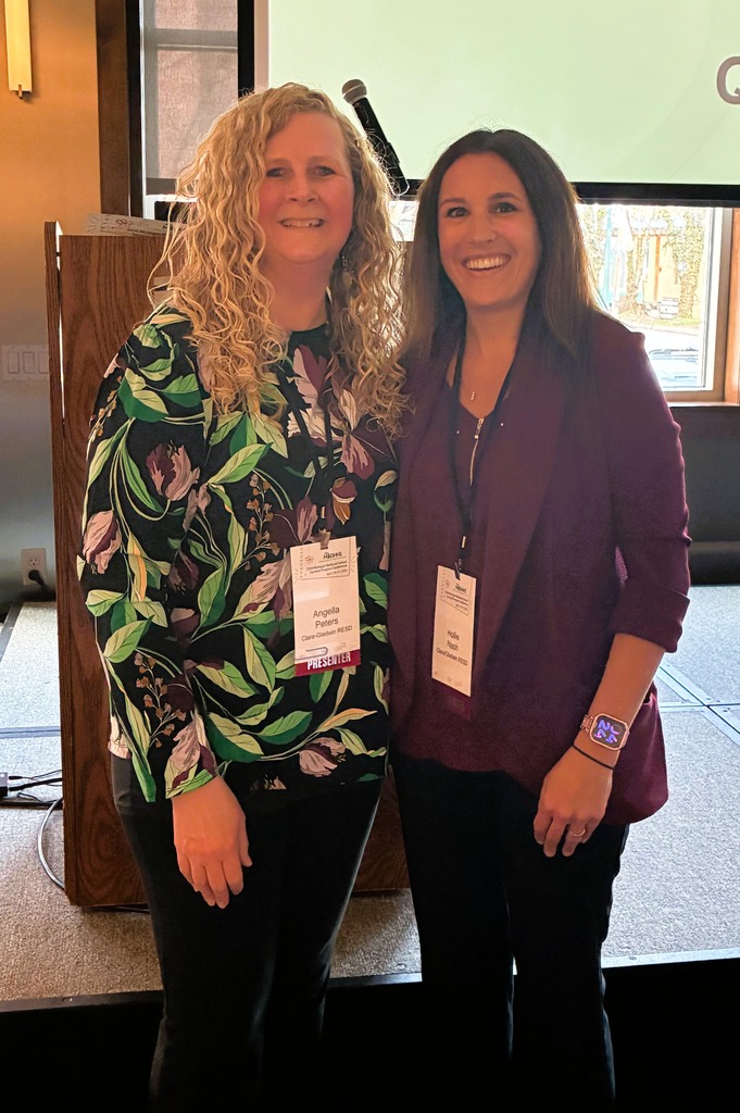 Hollie and Angella pose together . Collaborate Partnerships - Hearts and Minds are united for one cause, student wellbeing.  "Building bridge takes relationships, time, care, commitment, effort, patience, trust, integrity & resilience."