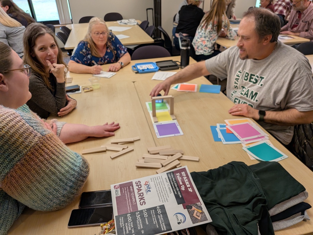 Teachers build arches and program robots to travel under them.