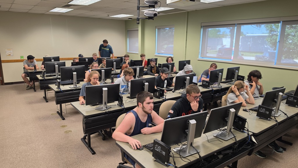 Students enjoying some hands-on Esports learning during the CMU Robotic and Esports camp. 