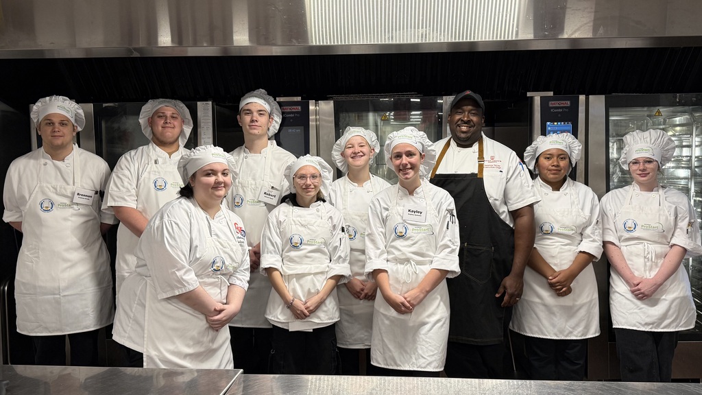 Student at Pro Start Summer Camp learning  from culinary professionals