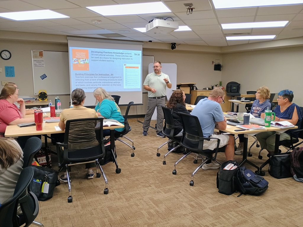 Teacher from the CGRESD region explore fraction concepts.