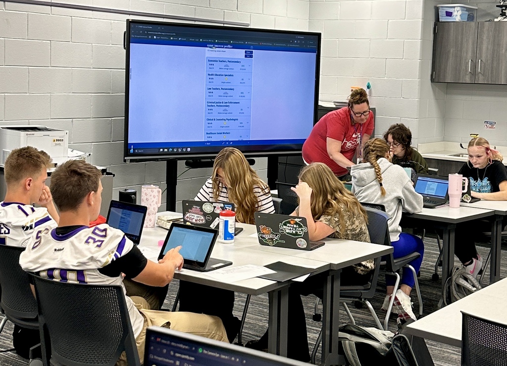 Health Occupations Instructor helping students