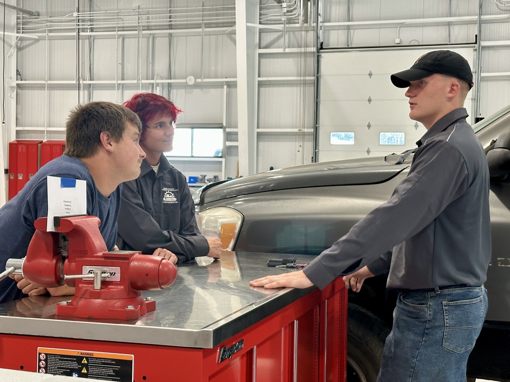 Diesel & Heavy Equipment 2nd year student talking to first year students