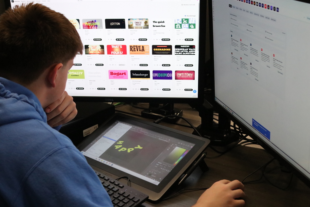 Student choosing which font face to use.