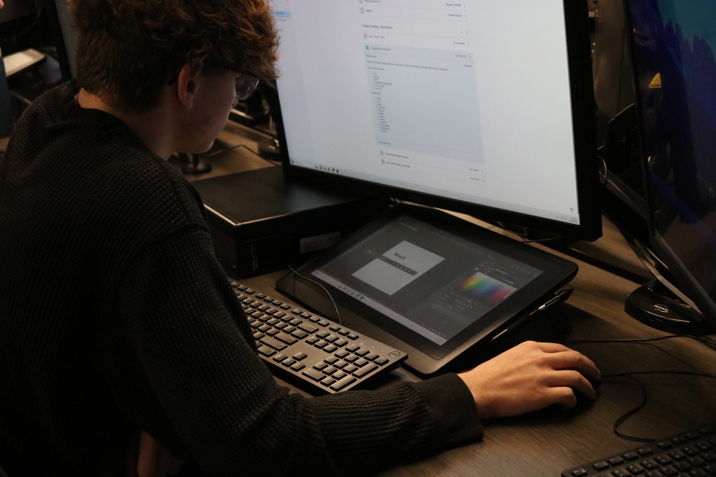 Student doing graphic design.