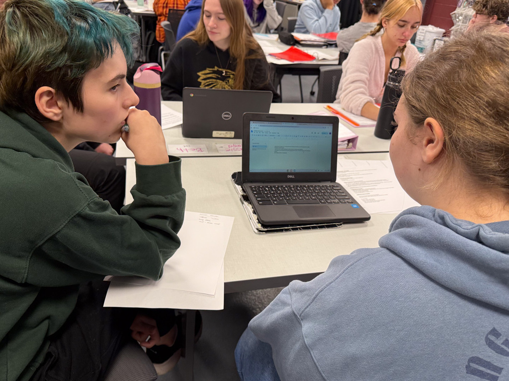 Students working a project together