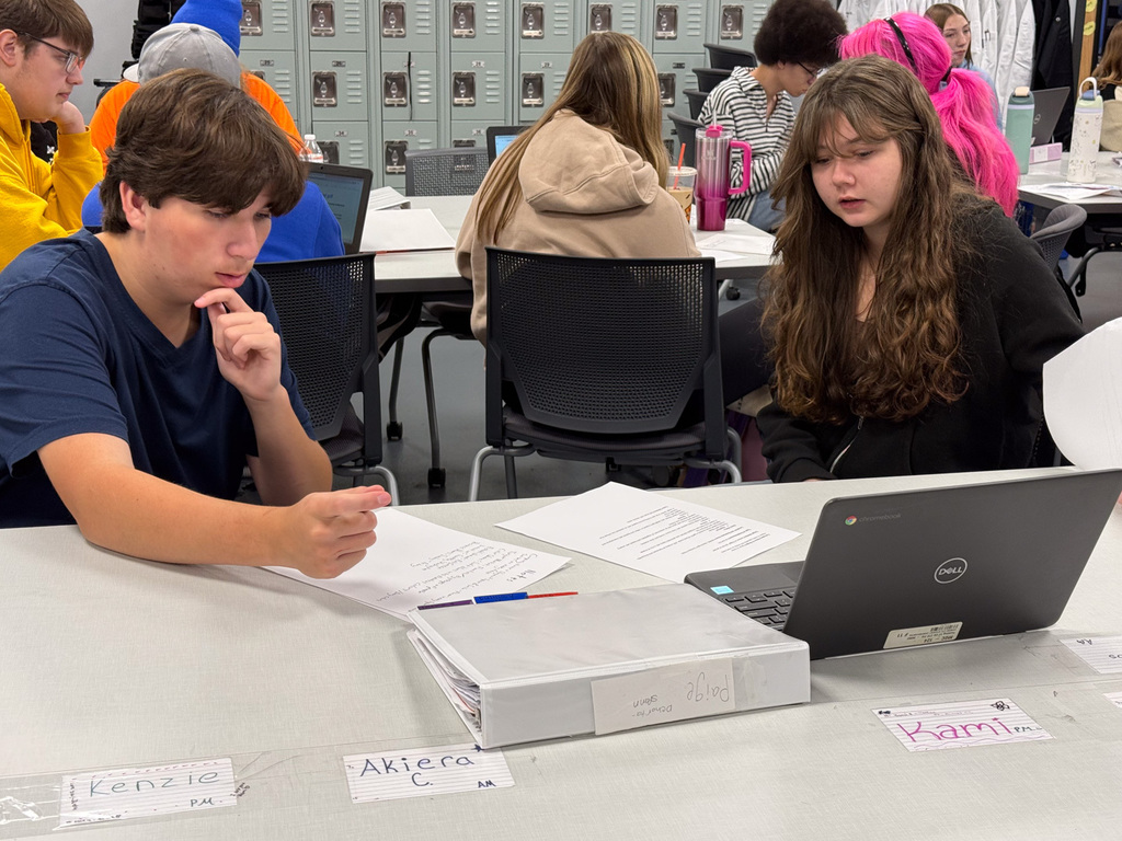 Students working a project together