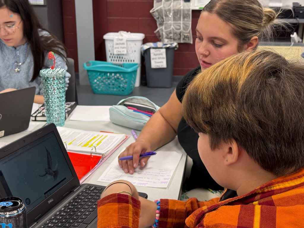 Students working a project together