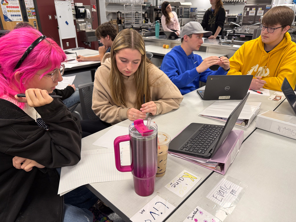 Students working a project together