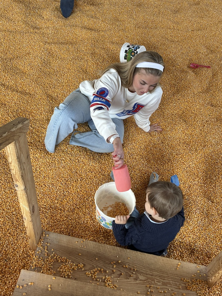 playing in corn pit